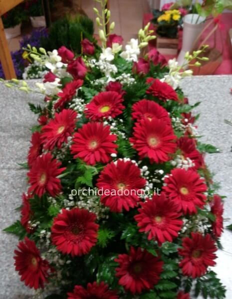 cuscino funebre con gerbere, dendrobium  ecc.